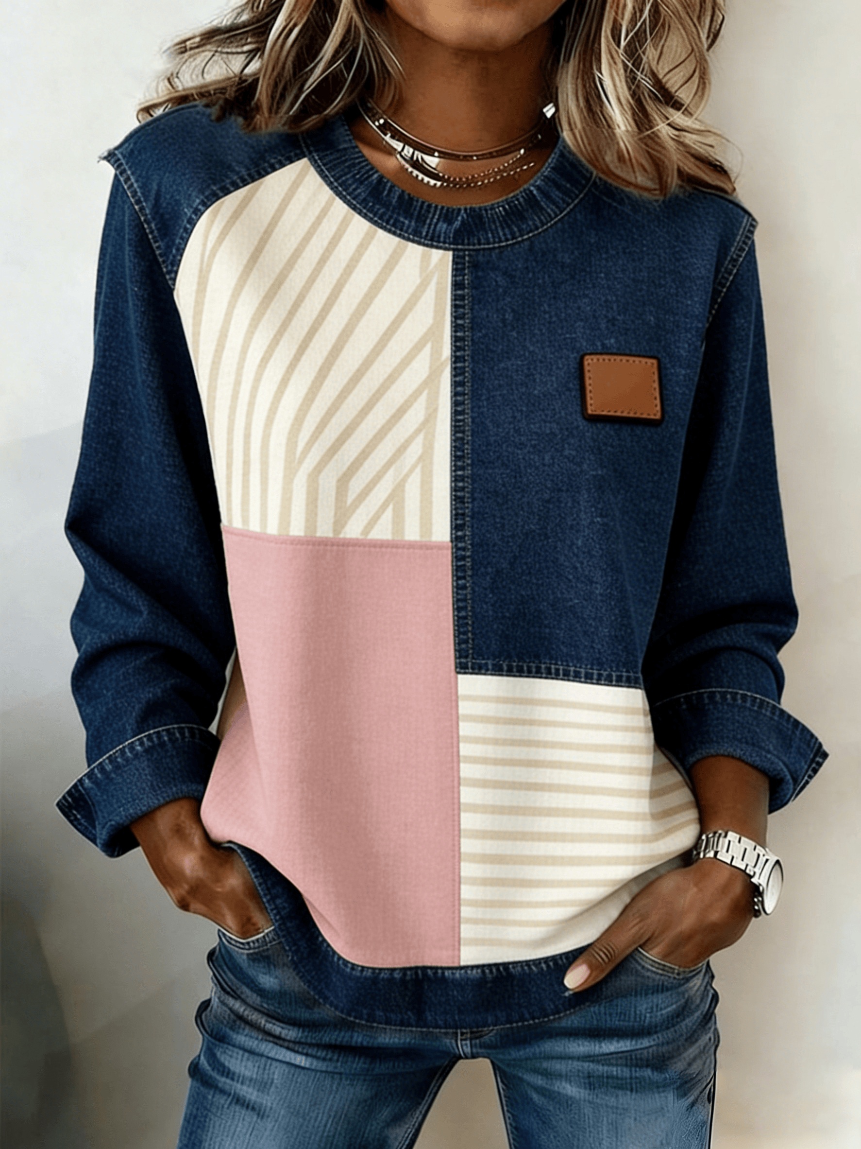 Women's loose-fit long-sleeve top with denim-style patchwork and leopard print details - Main product view
