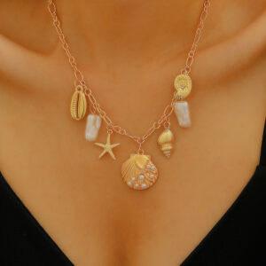 women’s gold-tone geometric necklace with pearl and shell-inspired details - Main product view