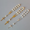 Unisex pearl cross full moon blessing bracelet in an electroplated finish - Main product view
