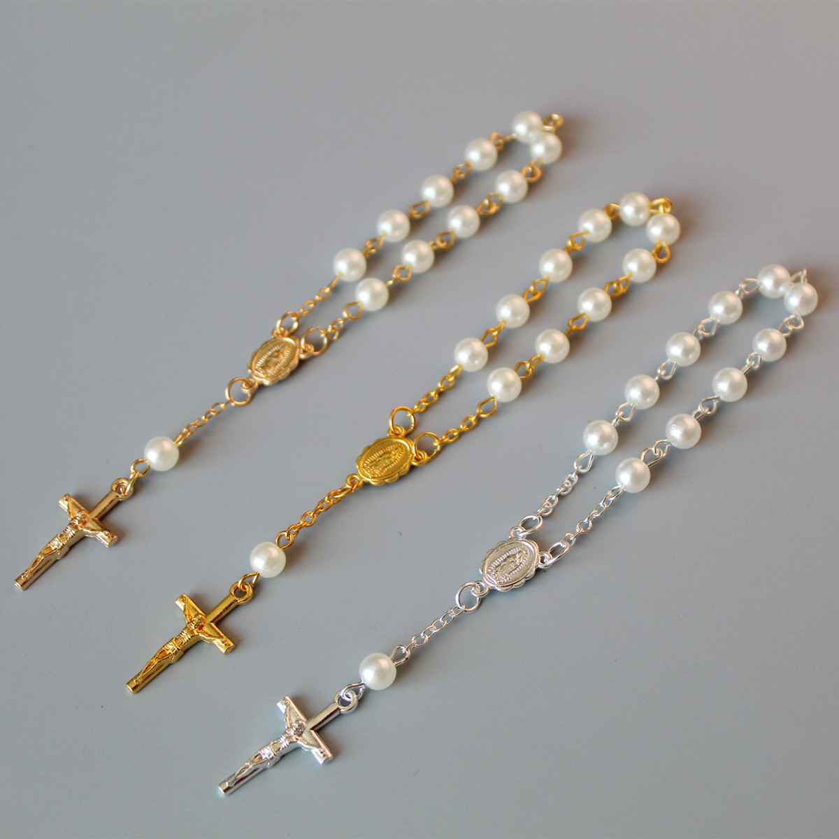 Unisex pearl cross full moon blessing bracelet in an electroplated finish - Main product view