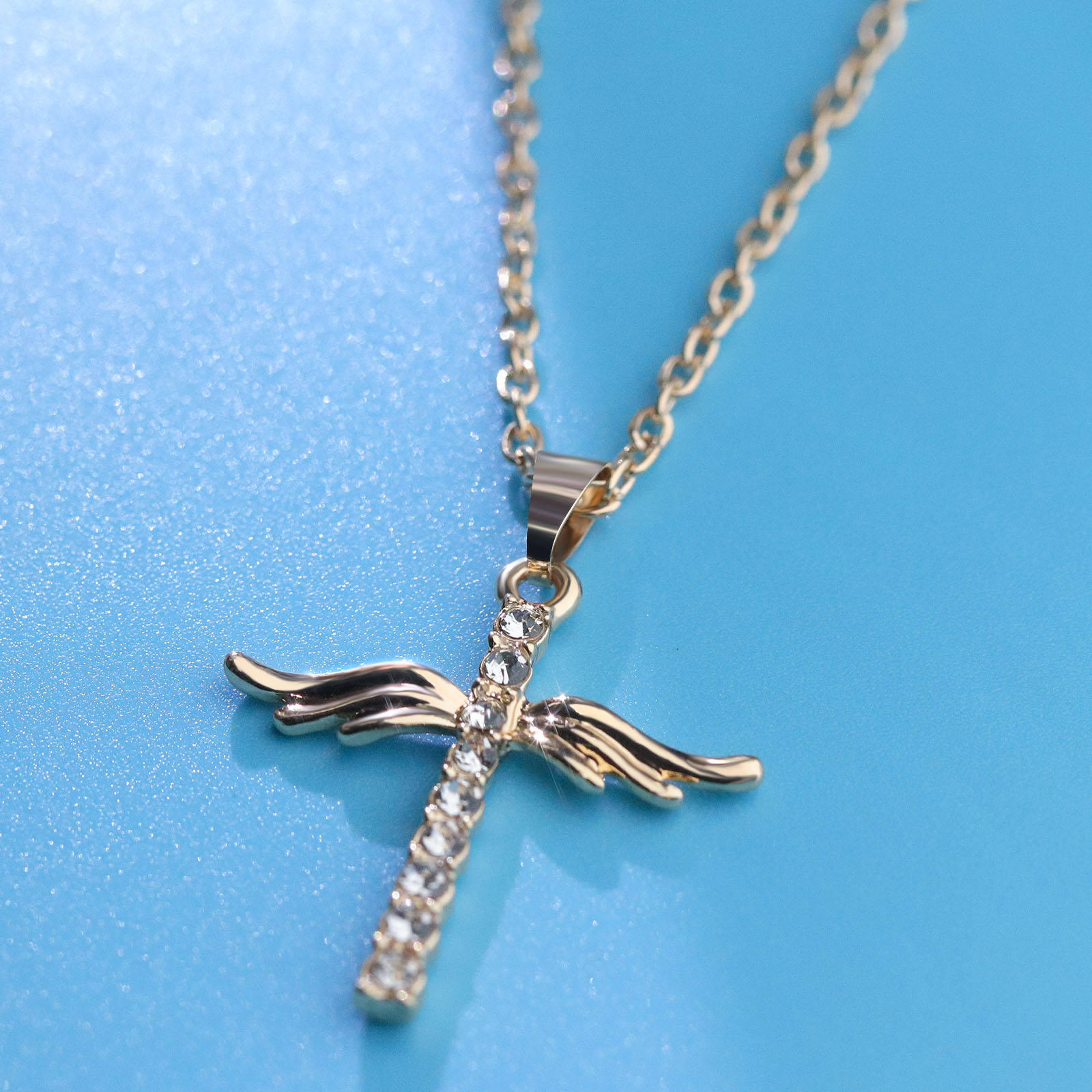 Angel wings cross pendant necklace with geometric design and snake-bone-style chain - Product view 6