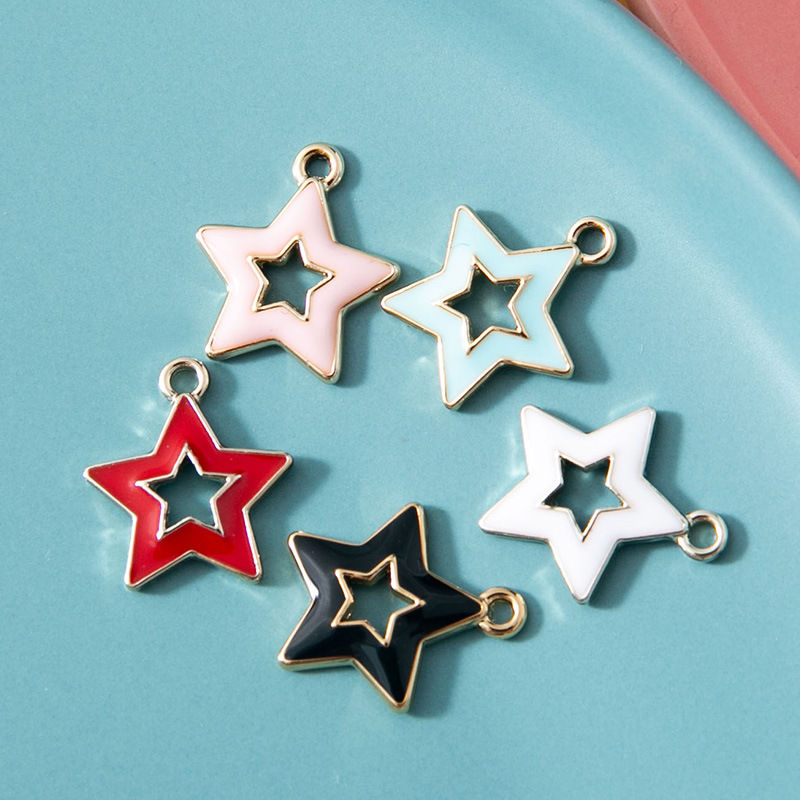 Hollow five-pointed star alloy pendant charm with plated finish - Main product view