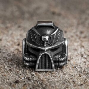 Men's black alloy ring with vintage skull, wing, and warhammer-inspired design - Main product view