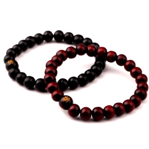 Natural wooden beaded Root Chakra bracelet with Buddha-inspired styling - Main product view
