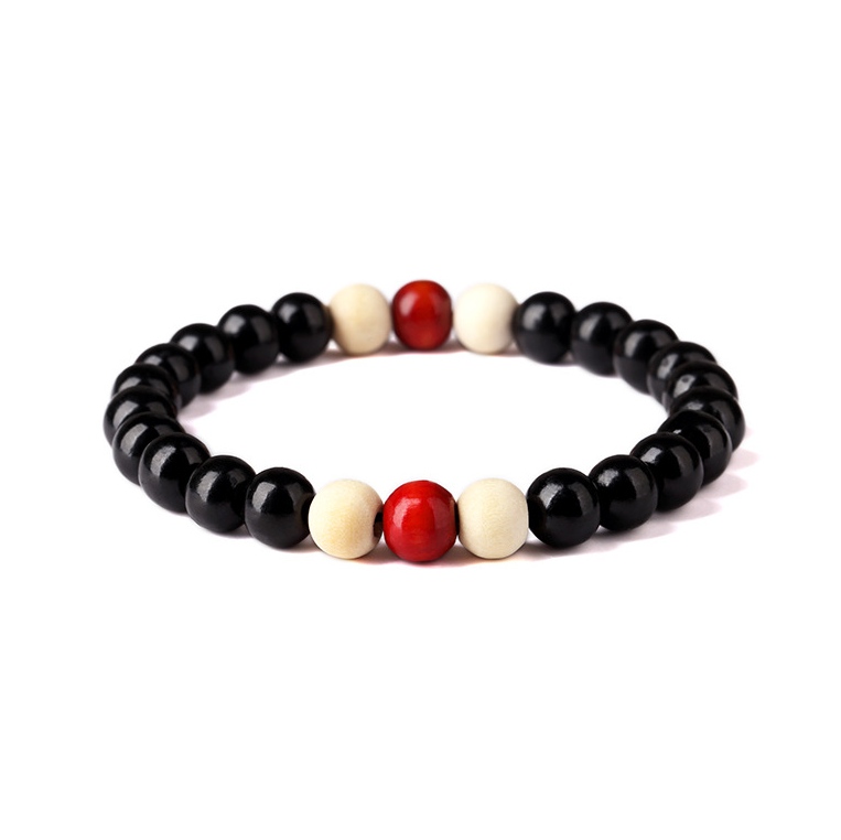 Natural wooden beaded Root Chakra bracelet with Buddha-inspired styling - Product view 3