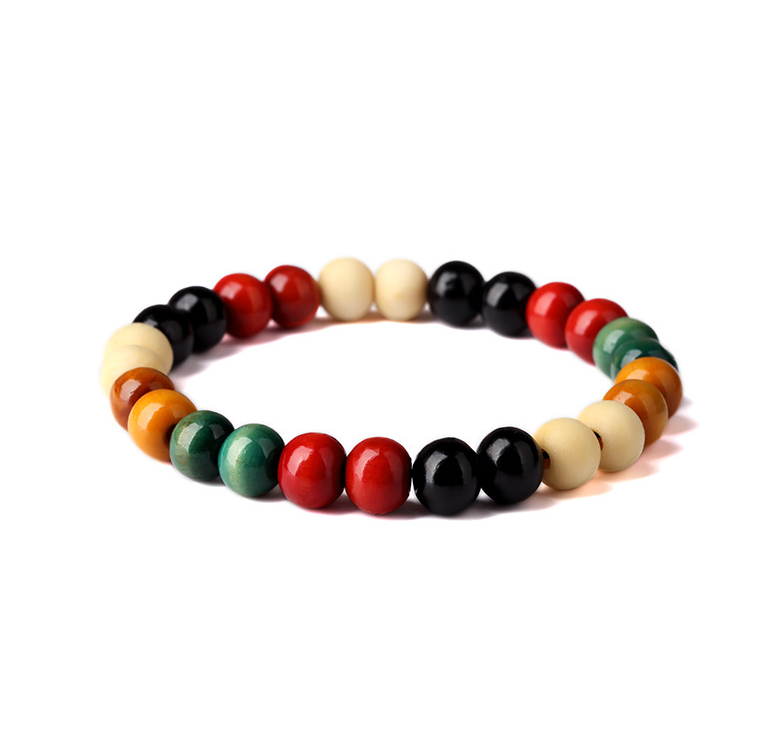 Natural wooden beaded Root Chakra bracelet with Buddha-inspired styling - Product view 11