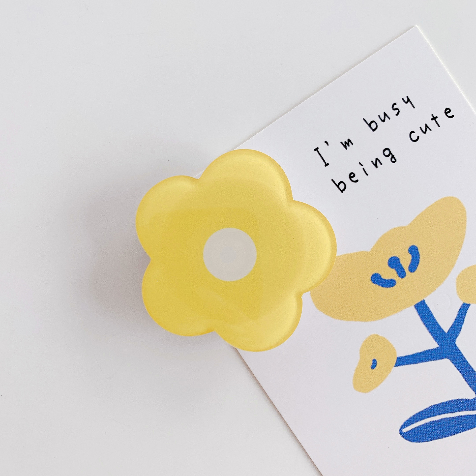 Small flower epoxy-style airbag phone holder bracket in a selected color - Yellow