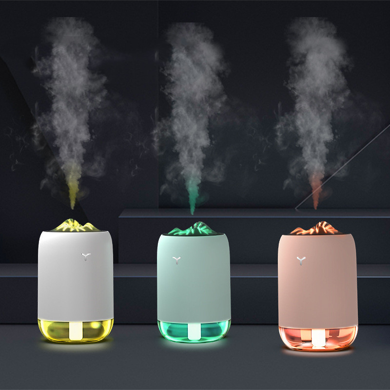 Mini ultrasonic flame humidifier and aroma diffuser in a compact column design - Main product view