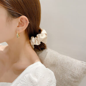 Mini round geometric wafer earrings with copper-plated finish and 925 silver hooks - Main product view
