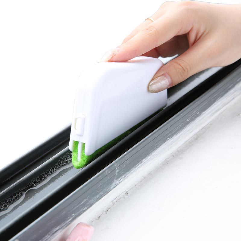Green brush for cleaning window grooves and narrow gaps - Main product view