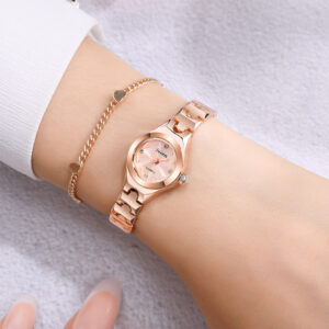 Small women’s quartz bracelet-style watch with round dial and horseshoe buckle - Main product view