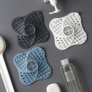 Black silicone hair drain catcher with suction cup base - Main product view