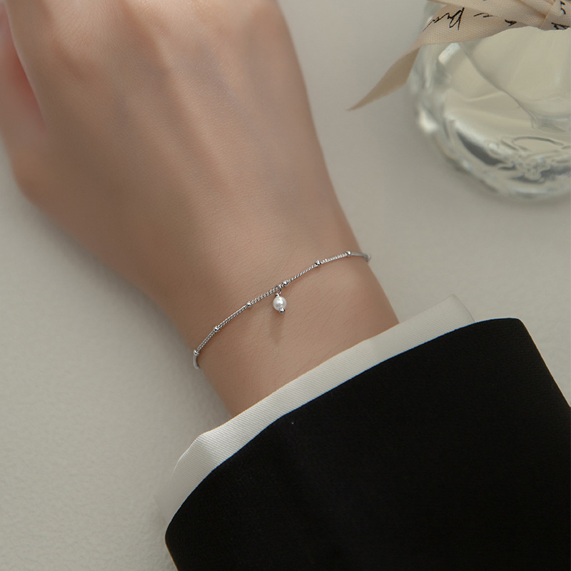 Women's S925 silver mini pearl bracelet in a silver or gold-colored finish - Main product view