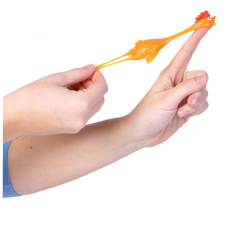 Yellow rubber chicken finger catapult prank toy - Main product view