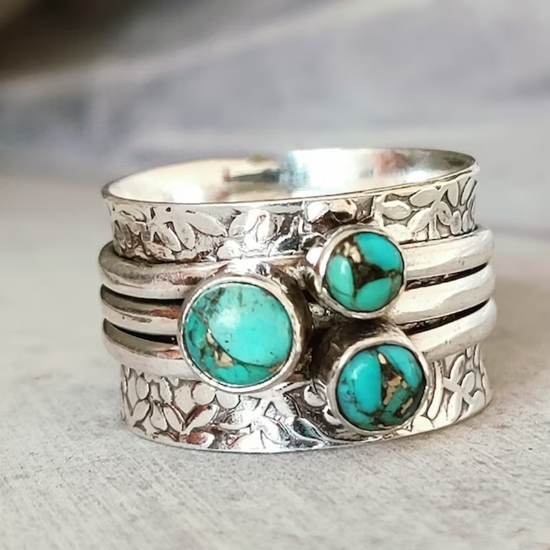 Vintage bohemian geometric alloy ring with three-eye turquoise-style detail and hammered finish - Main product view