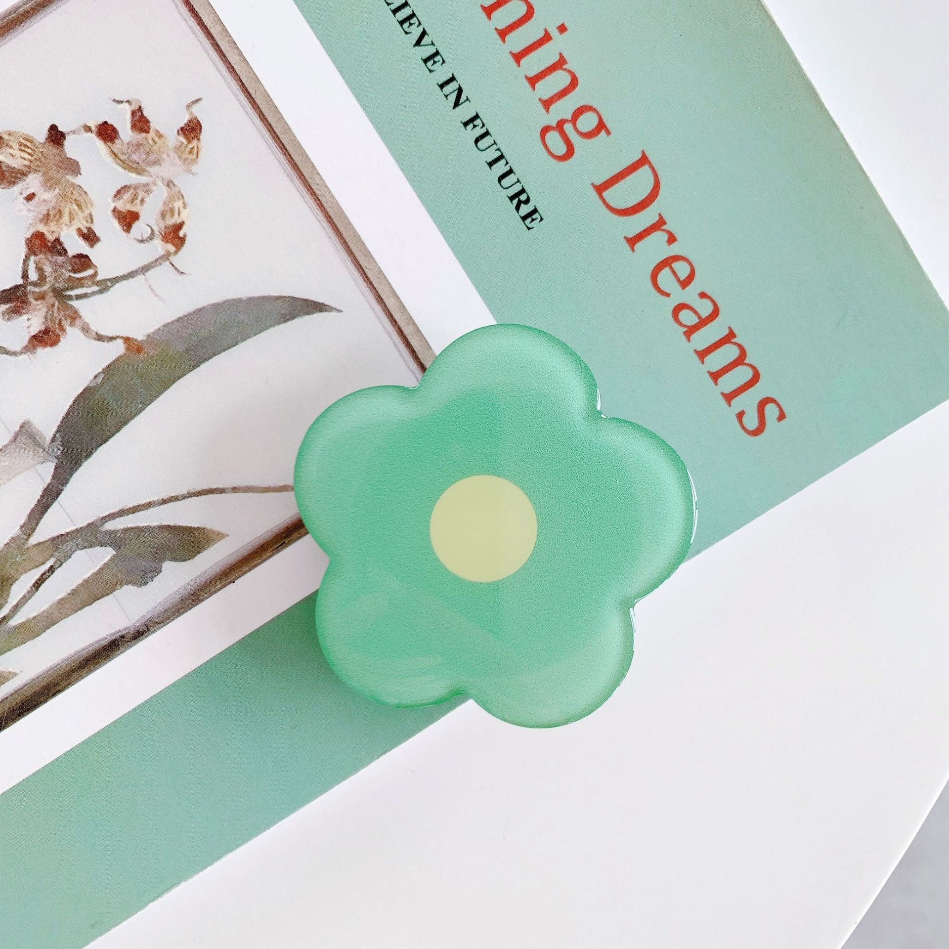 Small flower epoxy-style airbag phone holder bracket in a selected color - Green