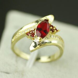 Red horse eye gemstone ring with geometric ellipse design - Main product view