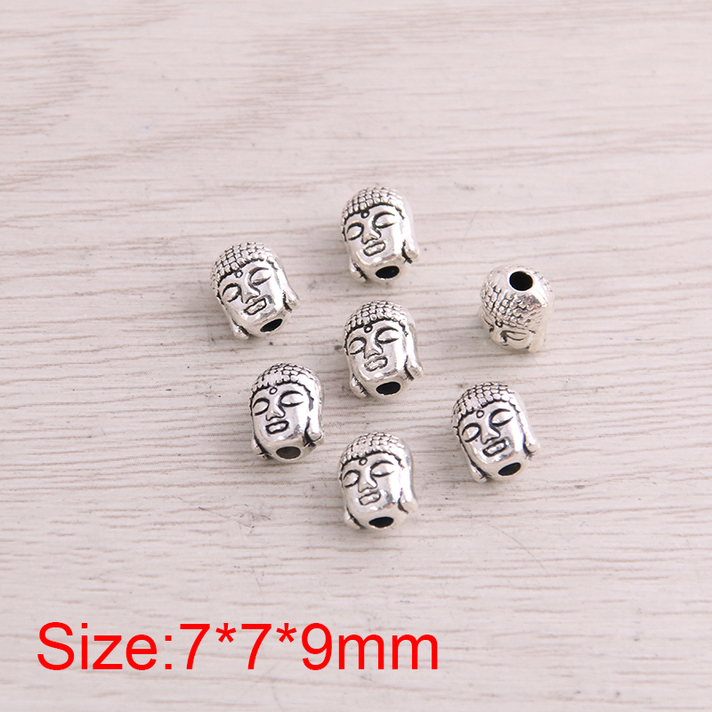 Buddha Lord large-hole alloy bead connector in an antique metallic finish - Main product view