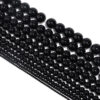 Round polished black agate loose bead - Main product view
