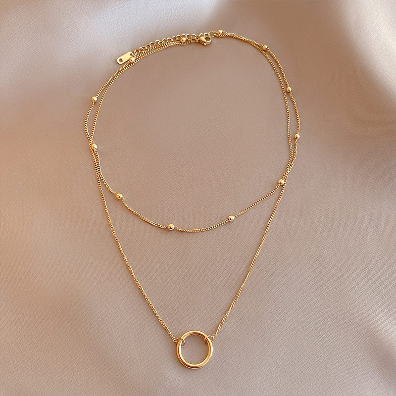 Women's 14K gold-tone double-layer pendant necklace with side-chain styling - Main product view