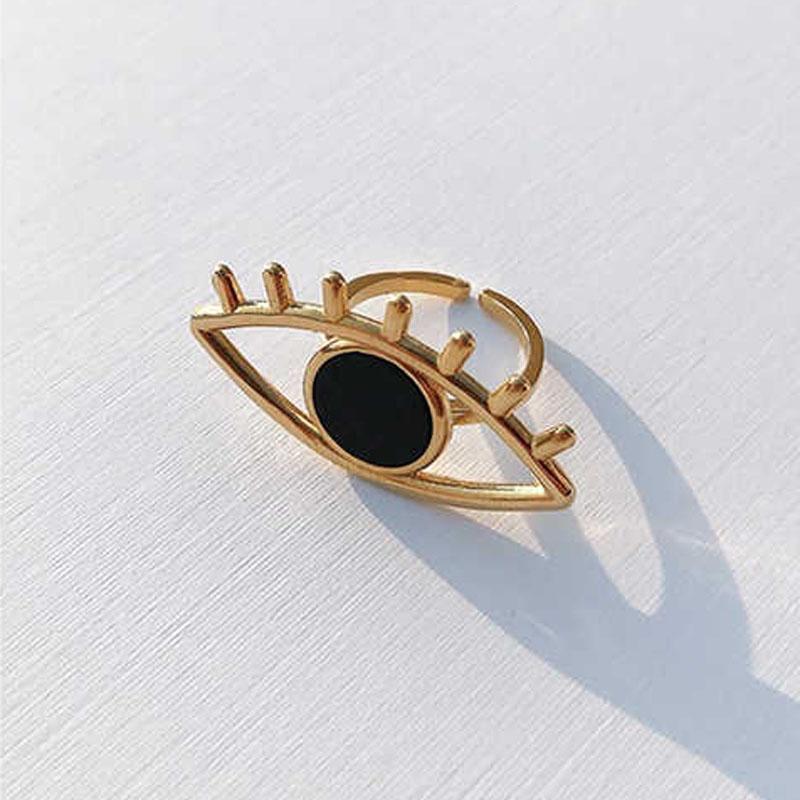 Long devil’s eye anchor cutout drop earrings in gold- and silver-tone options - Golden ring