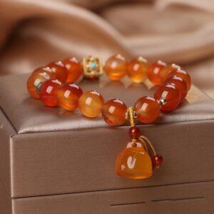 Orange natural agate bracelet with a flower-shaped lotus seedpod design - Main product view