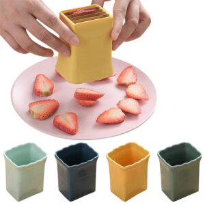 Stainless steel cup-style fruit slicer in a kitchen color option - Main product view