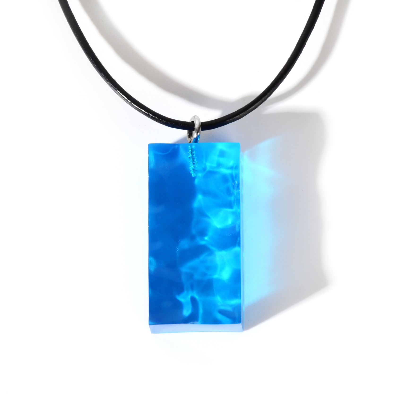 Geometric resin pendant necklace with leather cord-style necklace - Main product view