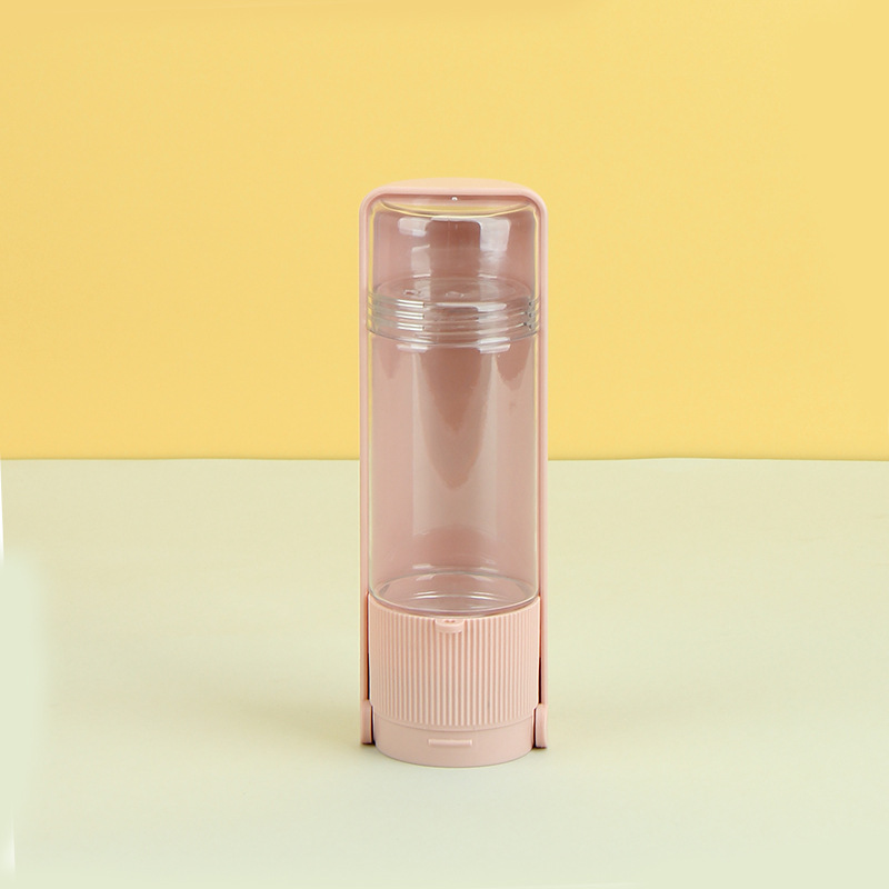 Portable dog water bottle with water trough and lower treat compartment - Product view 10