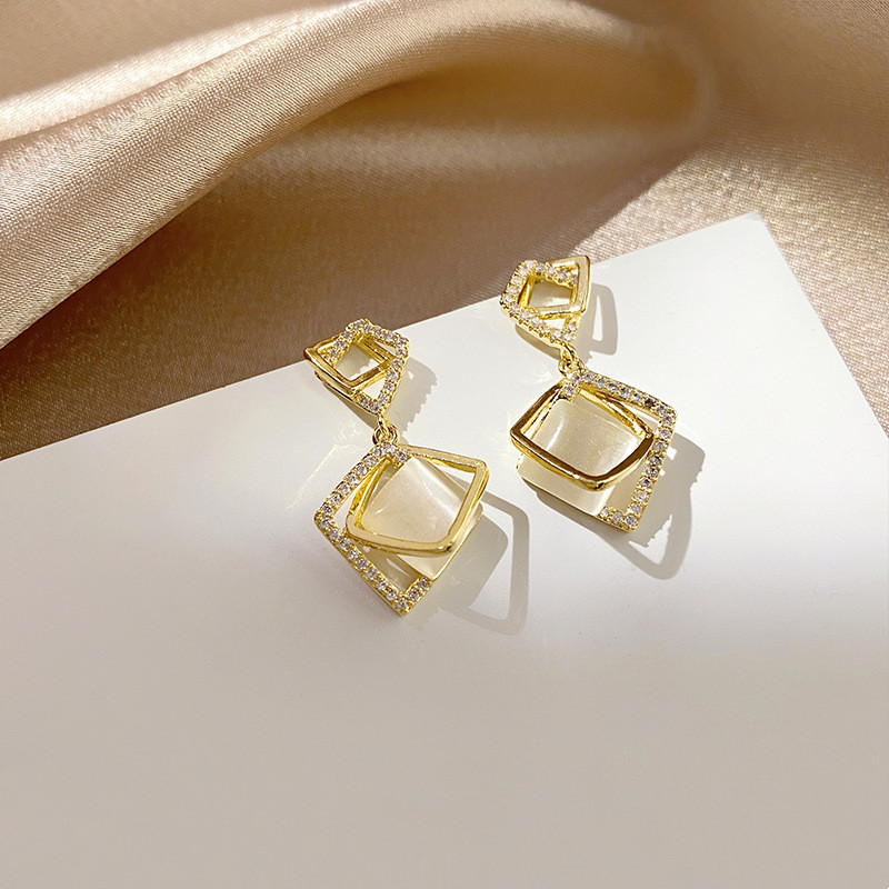 Women's geometric silver needle earrings in assorted opal, zircon, diamond, and cat-eye-inspired designs - Product view 2