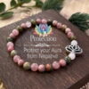 Handmade natural rhodonite stone bead bracelet with lotus design - Main product view