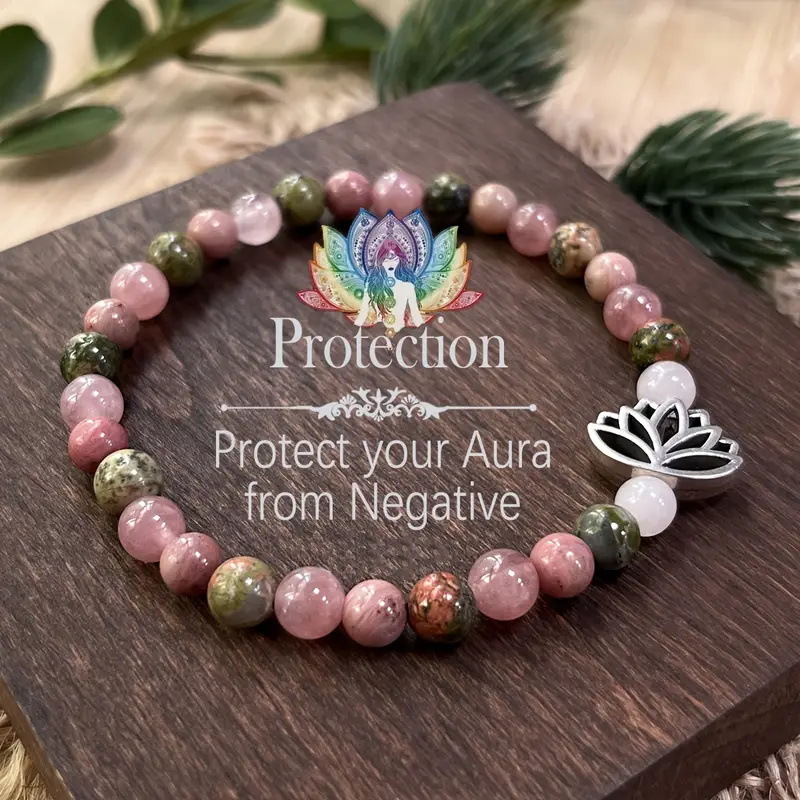 Handmade natural rhodonite stone bead bracelet with lotus design - Main product view