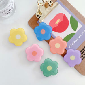 Small flower epoxy-style airbag phone holder bracket in a selected color - Main product view