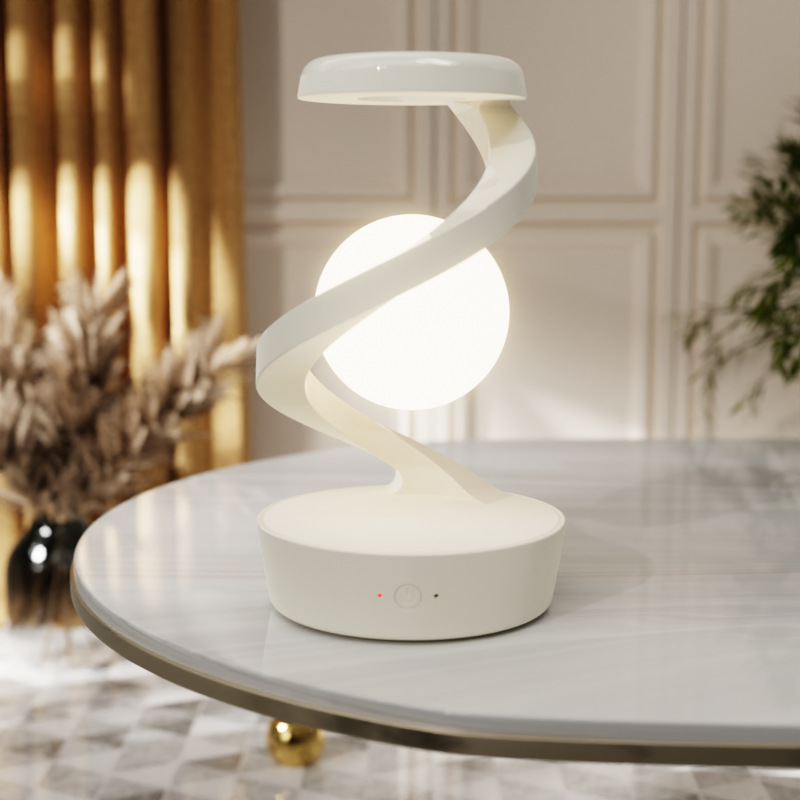 Rotating moon desk lamp with wireless phone charging - Product view 5