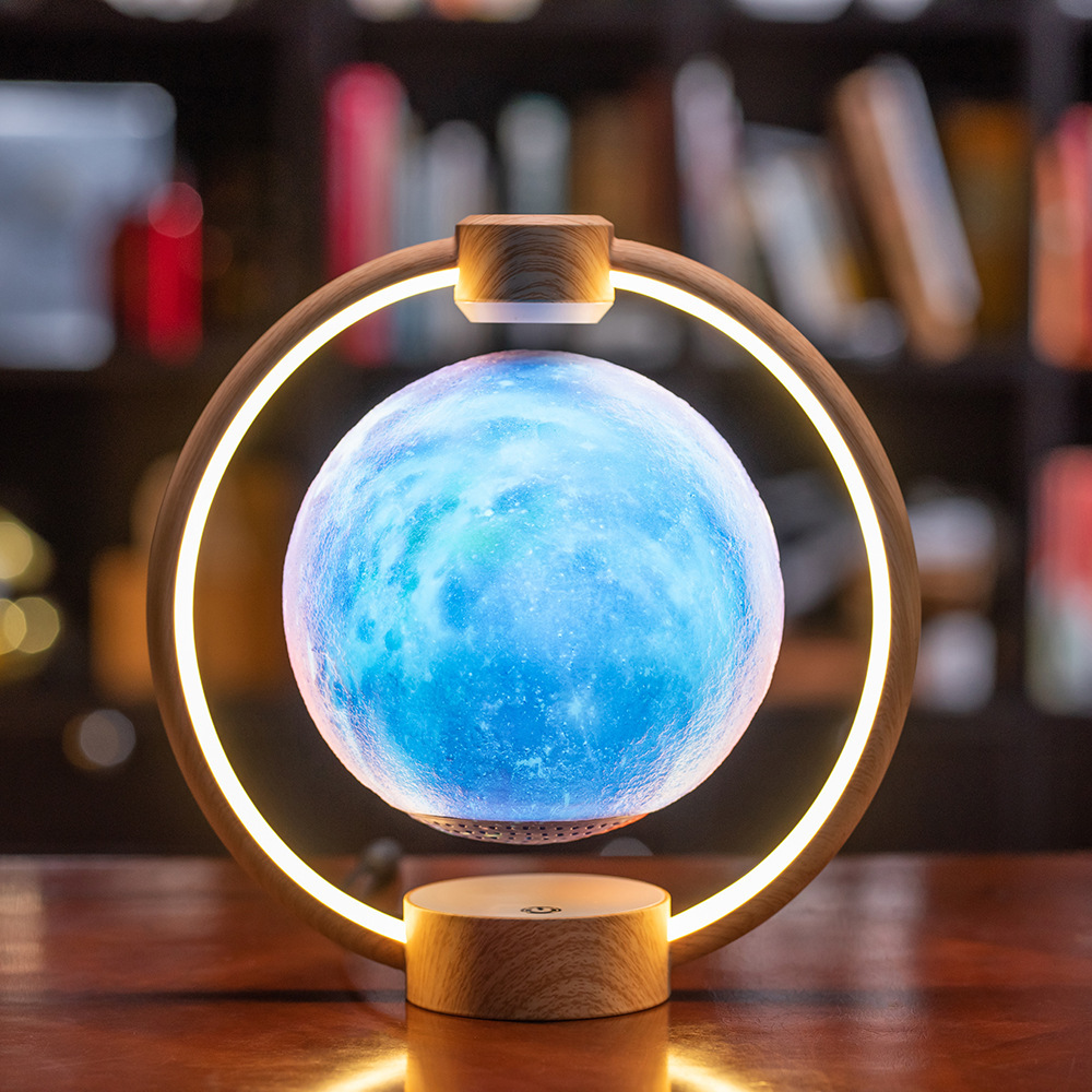 K1 floating moon Bluetooth speaker with rotating sphere, colorful lights, and wooden base - Main product view