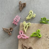 Mini bow side hair clip with small jaw-claw design - Main product view
