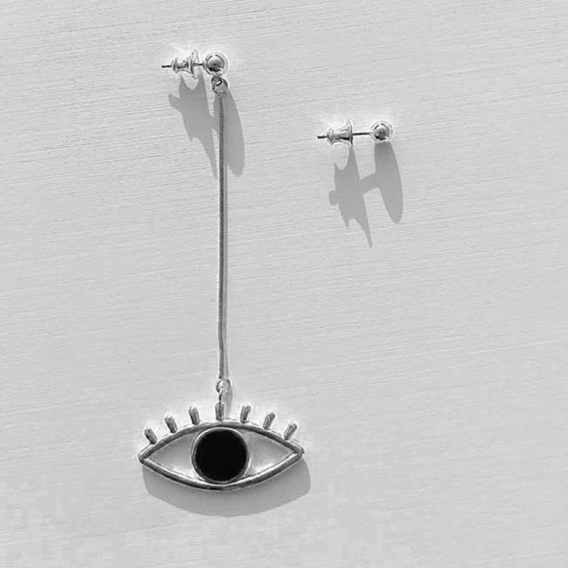 Long devil’s eye anchor cutout drop earrings in gold- and silver-tone options - Silver earrings