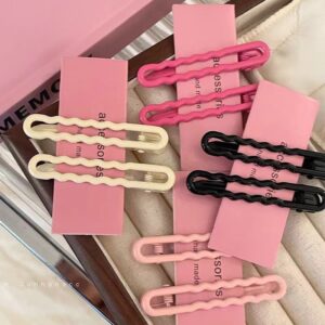 Hollow wave metal hair barrette in a colorful candy shade - Main product view