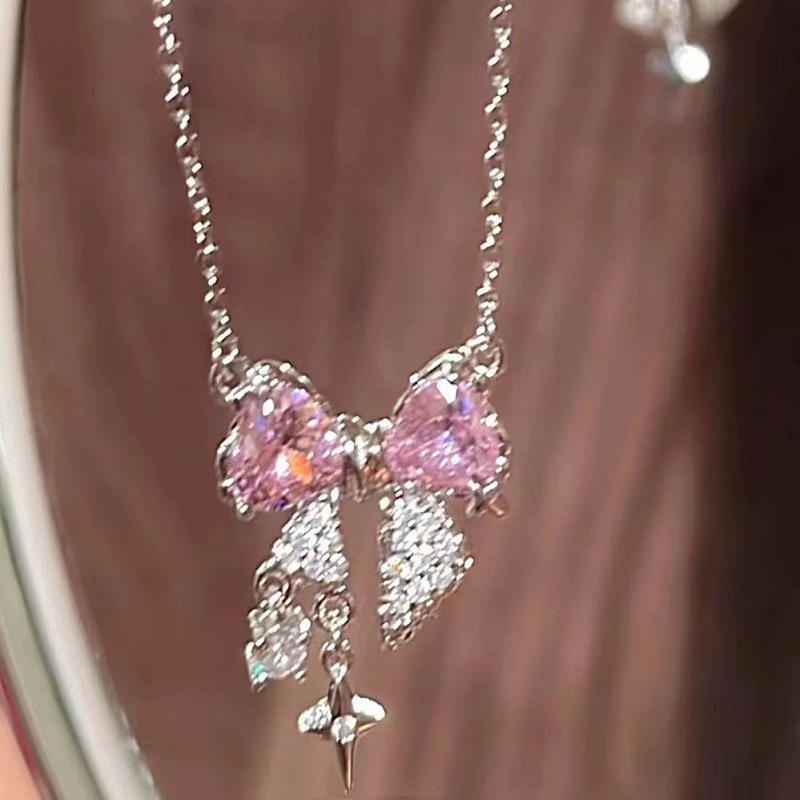 Elegant alloy bow necklace with a pink or white bow pendant - Product view 3