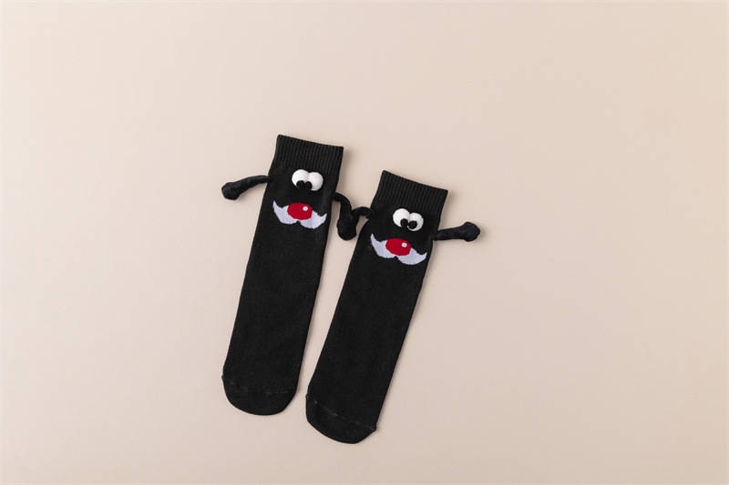 Magnetic Christmas novelty socks with festive character details - Product view 1
