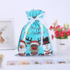 Christmas drawstring gift wrapping bag in a festive decorative design - Main product view