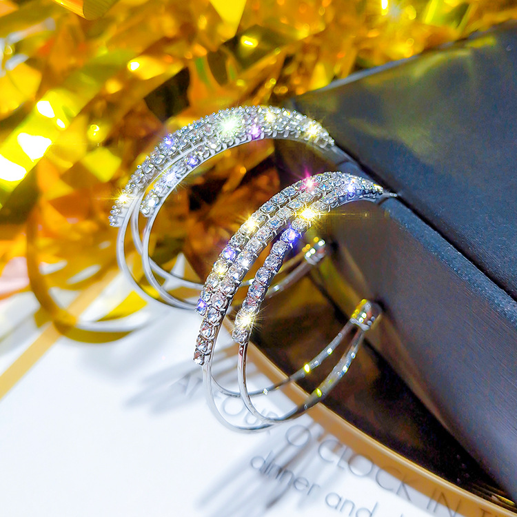 Geometric circle statement earrings in gold, silver, and rose gold - Product view 3