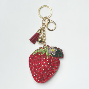 Diamond-encrusted strawberry keychain in red or pink - Main product view