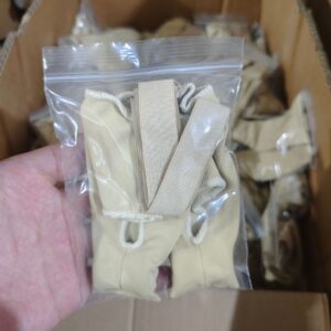 Unisex slip-on big toe corrector socks in black and skin tone - Main product view