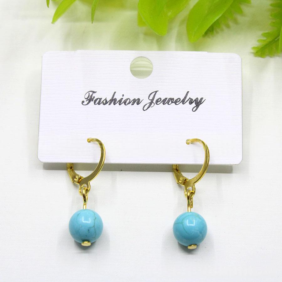 Round-bead crystal earrings in a natural stone-inspired color - Product view 6