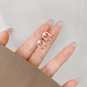 Women's assorted alloy stud earrings in pearl, heart, flower, geometric, bow, and butterfly designs - Main product view