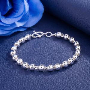 Silver-plated 6mm hollow Buddha bead bracelet with geometric design - Main product view