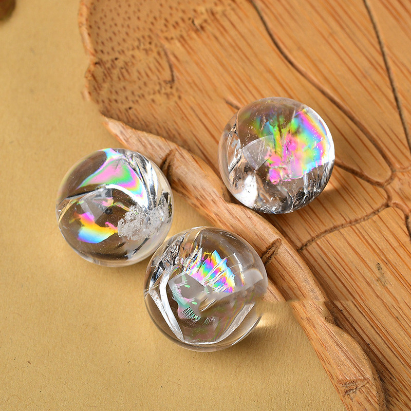 Rainbow-white natural crystal ball pendant with colorful random pattern - Main product view