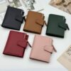 Women's trifold PU leather wallet with multiple card slots and hasp closure - Main product view