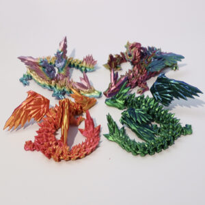 3D-printed crystal dragon with jointed movable wings in a colorful gradient finish - Main product view